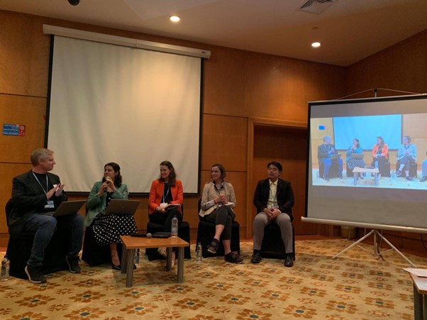 Karla speaking on the panel at a session at at COP27